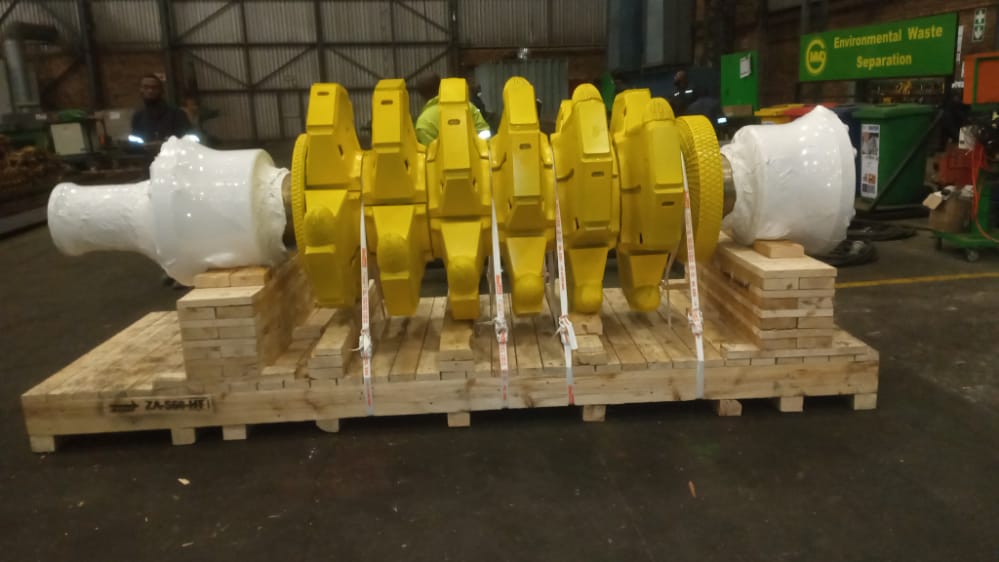 AfriPly industrial packaging with equipment secured using internal strapping for safe transport.
